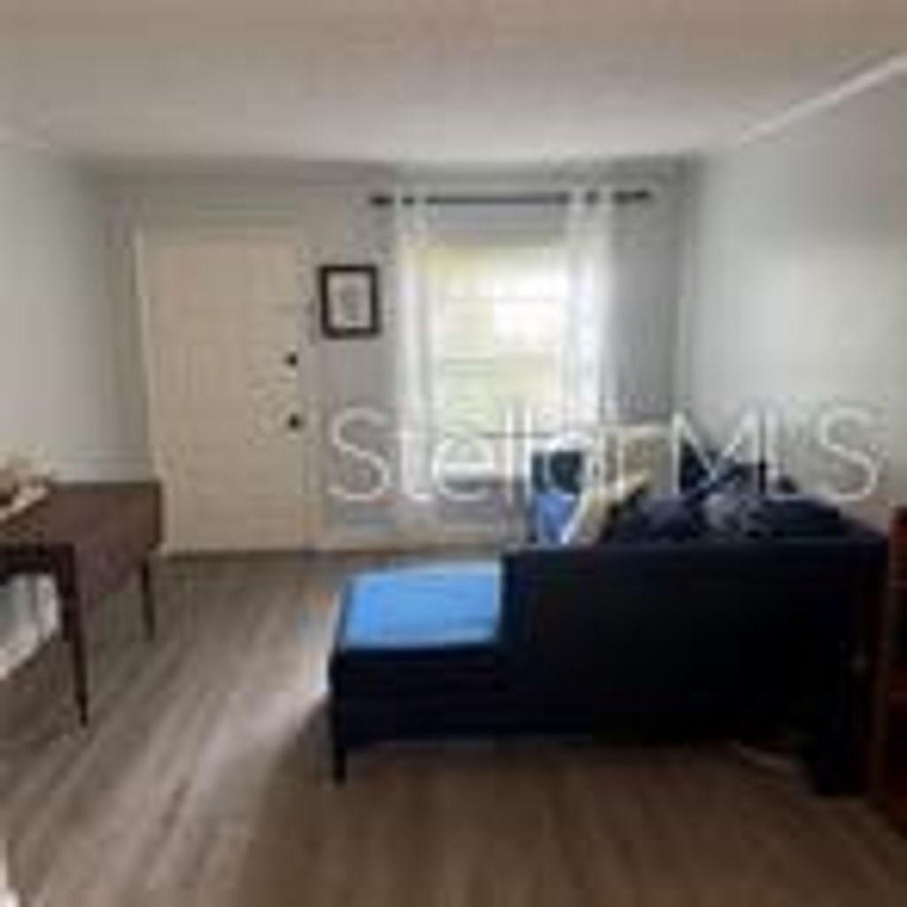 Photo of 14219 Shadow Moss Lane #102, Tampa, FL 33613 (MLS # TB8480189)