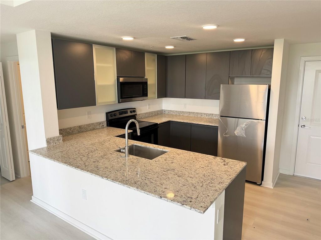 Photo of 5579 Millenia Park Boulevard #322, Orlando, FL 32839 (MLS # S5147903)