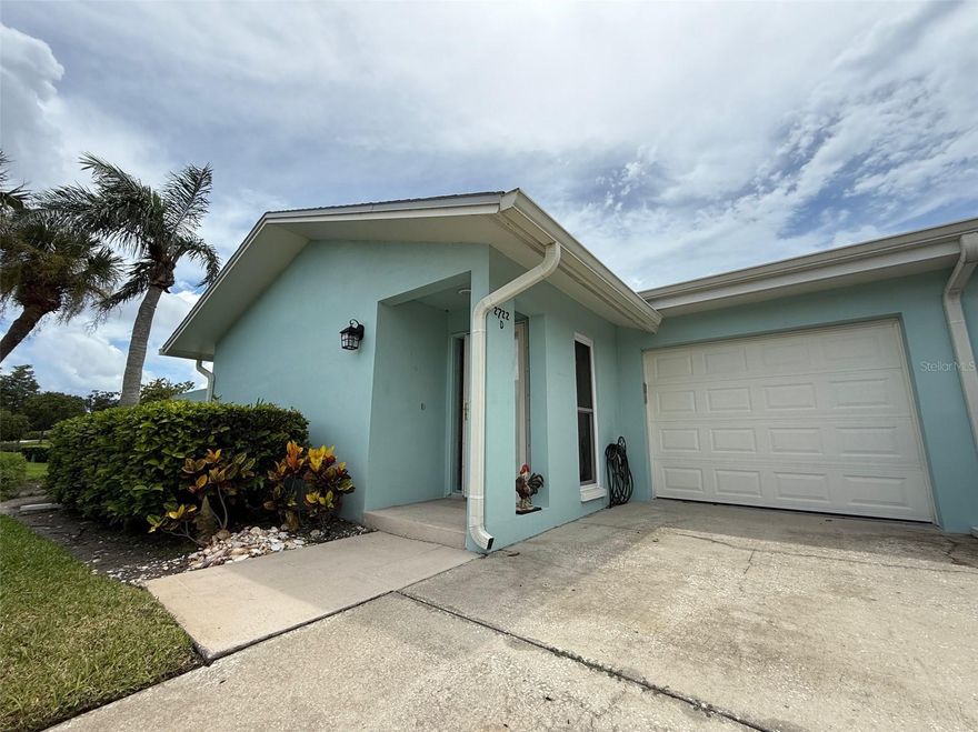 PRICE IMPROVEMENT!!!  Enjoy water views from every room!! Fully furnished 1BR/1.5BA condo for sale in the beautifully landscaped, maintenance-free 55+ golf community of Highland Lakes. Located just off US HWY 19 and next to the new Trader Joe’s, the condo is high and dry and not in a flood zone. This light and bright unit features hurricane-rated sliders and windows (2021), Shaw Versalock waterproof luxury vinyl plank flooring (tile in kitchen), Craftsman garage door, and a 1-car garage with laundry room, wash tub, and ample storage including two walk-in closets in the primary bedroom. Recent upgrades include commercial-grade water heater & softener (2021), washer/dryer (2022), refrigerator and dishwasher (2023). Shingle roof was replaced in 2020, flat roof replaced in 2023. Andover Village Community amenities include pool, clubhouse, shuffleboard courts, and plenty of scheduled social events. Purchase of additional recreation amenities including golf membership at Highland Lakes is available.  Land lease included in HOA dues. Plenty of guest parking. Whether you're looking for a peaceful retreat or a full-time residence, this home offers maintenance-free comfort and an unbeatable location close to shopping, dining, medical facilities, and the Gulf beaches.
