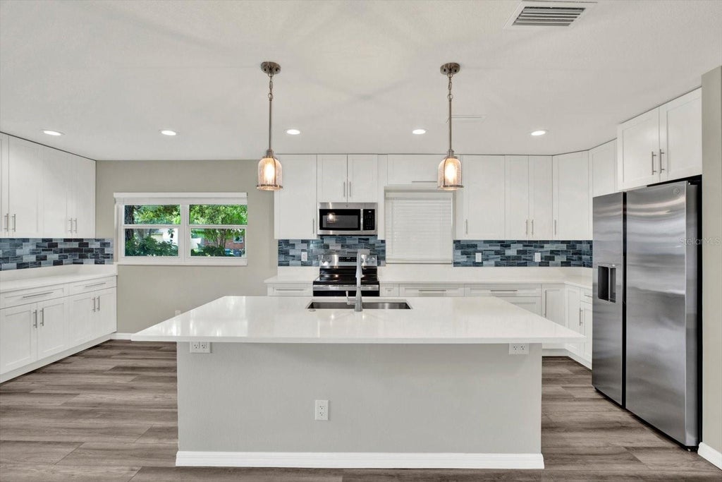 Photo of 7505 W Henry Avenue, Tampa, FL 33615 (MLS # TB8549465)