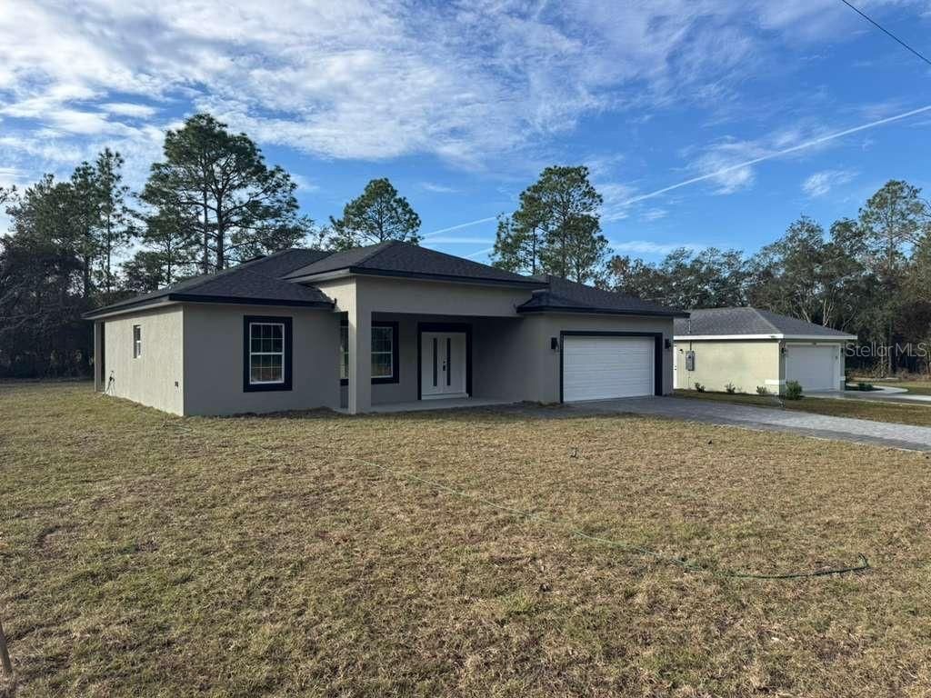 Photo of 2992 W Higgins Place, Dunnellon, FL 34433 (MLS # O6368395)