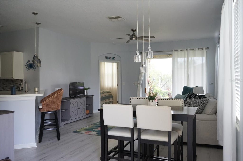 Photo of 2032 Inverness Greens Drive #76, Sun City Center, FL 33573 (MLS # TB8542384)