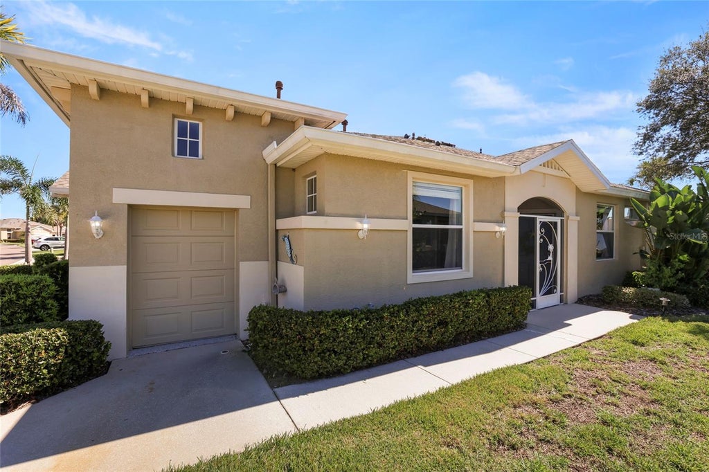 Photo of 2032 Inverness Greens Drive #76, Sun City Center, FL 33573 (MLS # TB8542384)