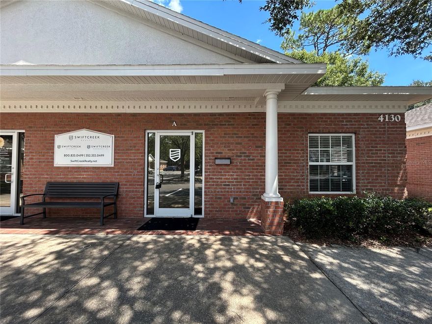 Great visible 39th Avenue frontage and signage, in MetroCorp Office Park on the corner of NW 39th Avenue and NW 43rd Street!
1,584 sq ft, furnished (if needed,) 7 offices (6 with windows), large conference room, kitchenette, private restroom and lobby.

Well furnished, includes desks, conference table, chairs, and minimal office equipment. Utilities are not included.

Plenty of parking within a perfectly maintained office park in the heart of NW Gainesville. Dumpster provided for trash.

Private front entrances in both front and back of building; 39th Avenue frontage signage available, and room for your business to expand and grow.

Well appointed kitchen bar with accessible restroom and flex spaces adjacent to the conference room.

Whether you're a solo entrepreneur, considerable firm, or growing business, this office provides a turnkey solution in a highly sought-after Gainesville location.

7 offices including 2 flex spaces