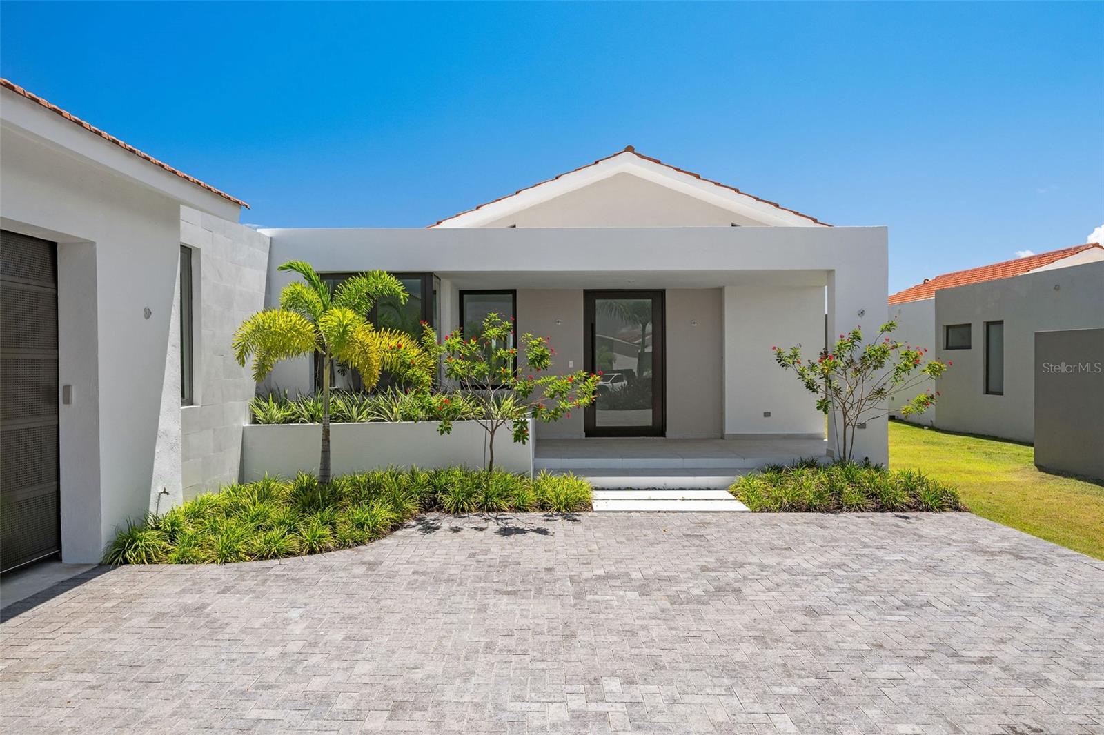 Welcome to this stunning, brand new home priced at $2,900,000, offering unparalleled luxury and space. With a generous 5,500 square feet of living area and set on a 1,150-square-meter lot, this exceptional property is designed to offer the perfect combination of comfort and style.
Features Include:
• 5 spacious bedrooms and 5.5 beautifully appointed bathrooms.
• Expansive living spaces, including a living room, family room, dining room, and breakfast room, perfect for entertaining.
• A gourmet kitchen with a large island and premium quartz countertops, ideal for culinary enthusiasts.
• A serene, rooftop terrace providing outdoor living space with sweeping views.
• A large backyard, offering plenty of space for relaxation and recreation.
• Double carport with a flush-panel garage door, golf cart parking, and additional storage.
Luxury Finishes and Inclusions:
• Rectangular ceramic floor tiles throughout the home, with anti-slip outdoor floor tiles and modern shower tiles in the bathrooms.
• Sleek, white bathroom and laundry appliances, coupled with laminated wood cabinets featuring soft-closing systems and stylish moldings.
• Fixed glass in the master bathroom and full glass continental windows, sliders, and doors with aluminum keep-safe glass for both elegance and safety.
• A grand solid wood entrance door, and semi-solid cedar wood interior doors that add warmth and charm.
• Custom closet systems in laminated wood, and cedar wood slats in the pantry for functional yet luxurious storage.
• The home is pre-fitted for a solar heater, mini-split units, cistern, power generator, smart home appliances, and photovoltaic panels for eco-friendly living.
This home is designed for the modern family, with attention to detail in every room. Spacious backyard and a flush-panel garage door complement the sleek, contemporary aesthetic of this property.
Live in style and comfort, with top-of-the-line finishes and smart home features that are sure to impress.