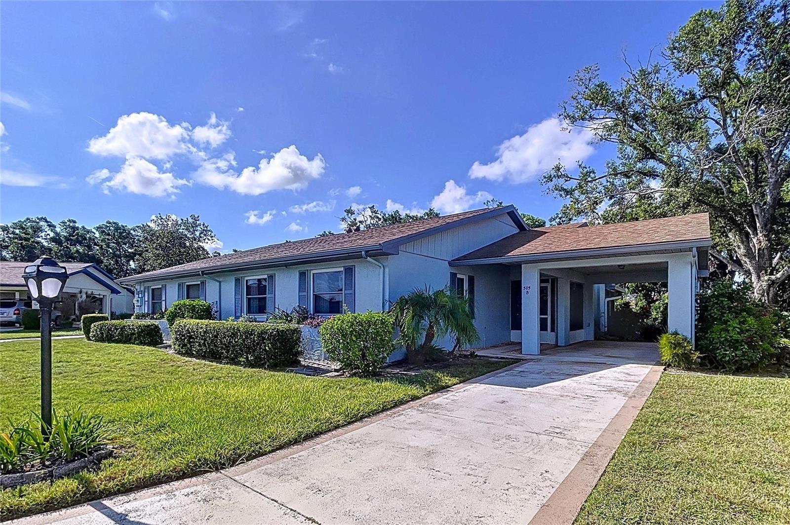 Welcome to Paradise! This lovely home has been meticulously cared for! imagine sitting on your lanai or even the airconditioned and heated sun room, overlooking a private nature sanctuary! Plenty of natural light in this home that also features a solar tube window in the family room ceiling! This 2 bed/2 bath home is perfect for the person that wants to relax in style without all the outside maintenance, in a community with plenty of activities. The new roof (2022) was upgraded by seller to include hurricane straps! The electric panel was replaced in 2020. The open floor plan concept is desirable for entertaining, easy access from your carport to the front door - and the laundry room is attached to the lanai outside which helps keep the inside of your house cooler in the summer! EXTRA SPECIAL: all off the built-in cabinets in the family room and the wet bar! Plenty of extra storage for your keepsakes! Don't miss seeing this extraordinary home!
Residents enjoy two fully functional clubhouses that include dancing, cards, lots of social activities and clubs, indoor and outdoor pools, restaurants, pickleball, everything you need is accessible by golf cart! The association covers, the gate and guards, roof, insurance, trash, pest control, cable and water. The golf course is robust - an optional golf membership with ClubLink might be just what you need! Resort style living, best place to retire! Nestled in between Tampa and Sarasota, easy access to beaches, St Petersburg and all the fun Orlando offers! Schedule your showing today!