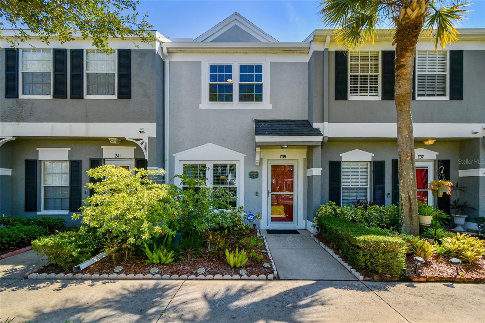 Welcome to this beautifully maintained 2 Bedroom, 1.5 Bath townhome located in the highly desirable gated community of Countryside Key in Oldsmar. This move-in ready home features NEW INTERIOR PAINT (2025) in soft neutral tones, LUXURY VINYL PLANK FLOORING (2023) on the first level, and NEW CARPET (October 2025) on the second floor. The bright and inviting open-concept layout includes spacious family and dining rooms at the front of the home and a kitchen and laundry area at the rear, complete with NEW STAINLESS-STEEL REFRIGERATOR, DISHWASHER, AND RANGE (2023), plus a MICROWAVE (2018). Sliding doors lead to a PERMITTED ENCLOSED PORCH (2007) featuring HURRICANE IMPACT WINDOWS—an ideal space for morning coffee or evening relaxation. Metal shutters designed to fit over the lanai windows will also convey with the sale, providing added protection. Upstairs, you’ll find two nicely sized bedrooms and a full bath that has been thoughtfully reconfigured to include a LARGE WALK-IN SHOWER and a VANITY WITH DUAL SINKS. Additional updates include a NEW HVAC (2023), WATER HEATER (2020), HURRICANE IMPACT WINDOWS (rear 2018, front 2025), NEW STORM DOOR (2020), NEW GUTTERS (June 2025), and UPDATED LIGHTING AND CEILING FANS throughout. The WASHER AND DRYER (2022) will also convey with the sale. The HOA takes care of nearly everything, including water, internet/cable, exterior building insurance, sewer, trash, landscaping, exterior maintenance, and pest control—providing exceptional value and ease of living. Countryside Key residents enjoy access to a community pool, tennis courts, and gated security. Ideally located close to shopping, dining, and entertainment in Oldsmar and Countryside, and just minutes from Safety Harbor, Dunedin, Honeymoon Island, and Tampa International Airport, this home offers the perfect combination of comfort, convenience, and the relaxed Florida lifestyle.
