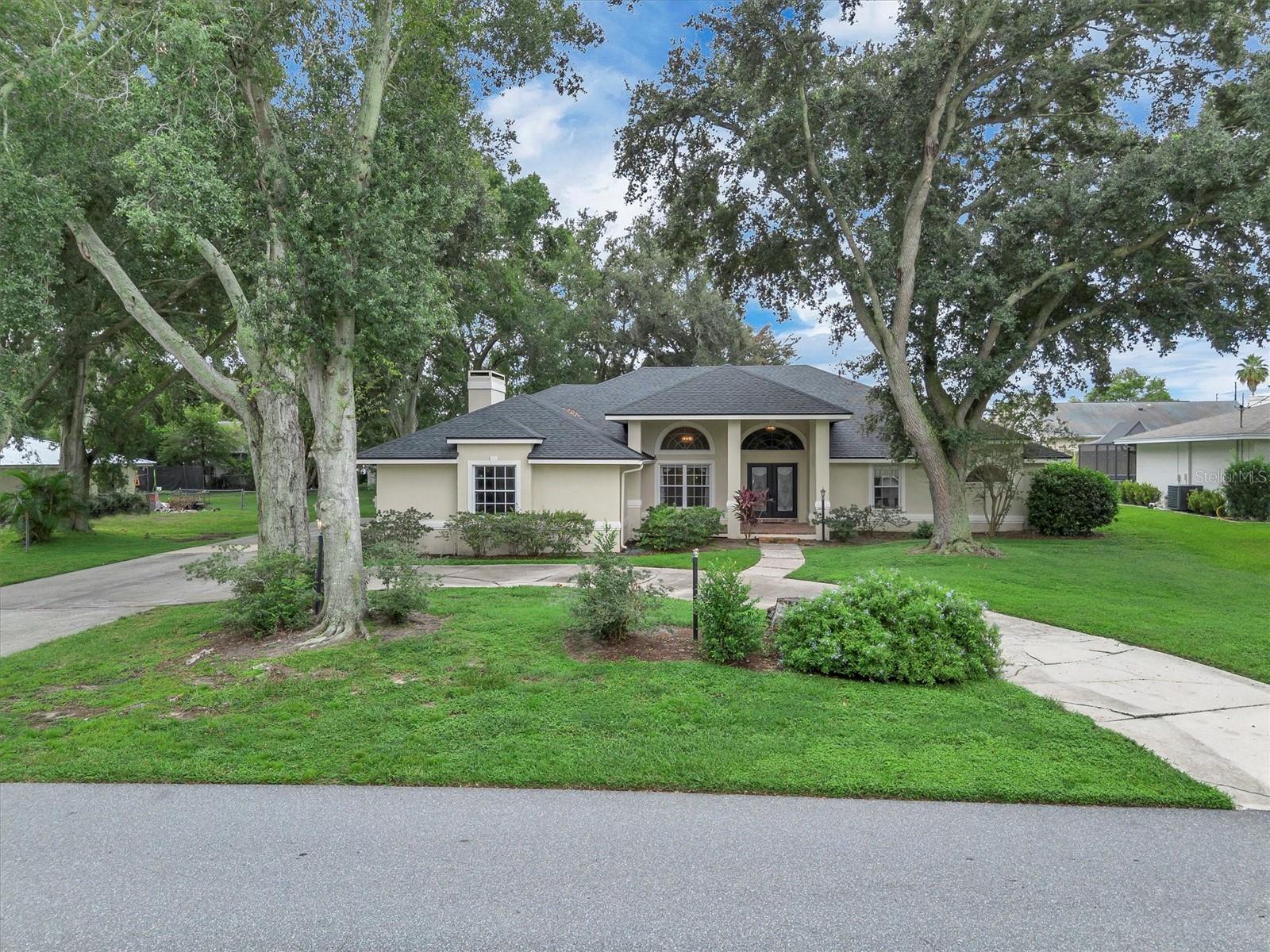 Houses like this don't come around often. 345 South Lake Florence Drive offers you 3 bedrooms, 2 bathrooms, office, formal dining, formal living, game room, loft, gorgeous family room, 3 car garage and a pool. The grand entrance has soaring ceilings that carry through the main living space and into the family room with its original wood burning brick fireplace. You'll have plenty of space to entertain with over 3,000 square feet of living space. You will be located directly across the street from Lake Florence Park with access to the public dock for fishing or loading in paddle boards for a day on the lake. Just minutes away from Legoland and close to plenty of shopping, restaurants and medical facilities 345 South Lake Florence is ideally located for your enjoyment. The house was re-piped in 2020, new water heater in 2020, two new a/c units in 2022 and a new roof in 2022. Don't miss this opportunity to purchase a truly unique home in a great location. Listing agent is owner. House sold as is.