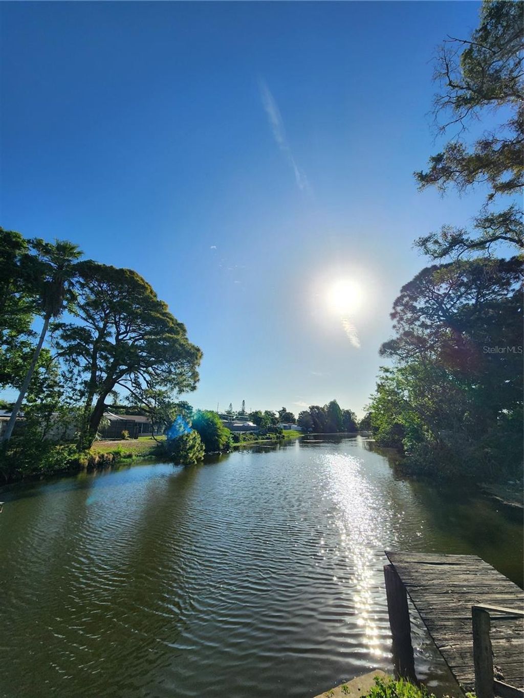 Photo of 5973 Mckee Lake Drive N, St Petersburg, FL 33709 (MLS # TB8501560)