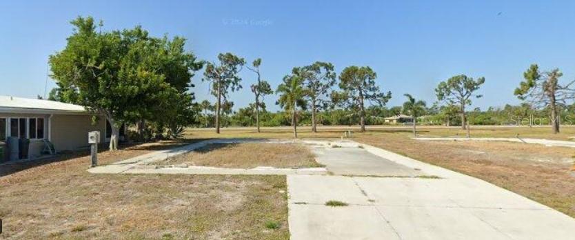 Build Your Florida Dream!
This cleared lot in the Village of Holiday Lake offers a concrete pad, utilities in place, and a perfect location near community amenities. Ideal for your mobile home in a friendly, active waterfront community with pools, tennis, boat ramp & more. Minutes from beaches, golf, and dining!