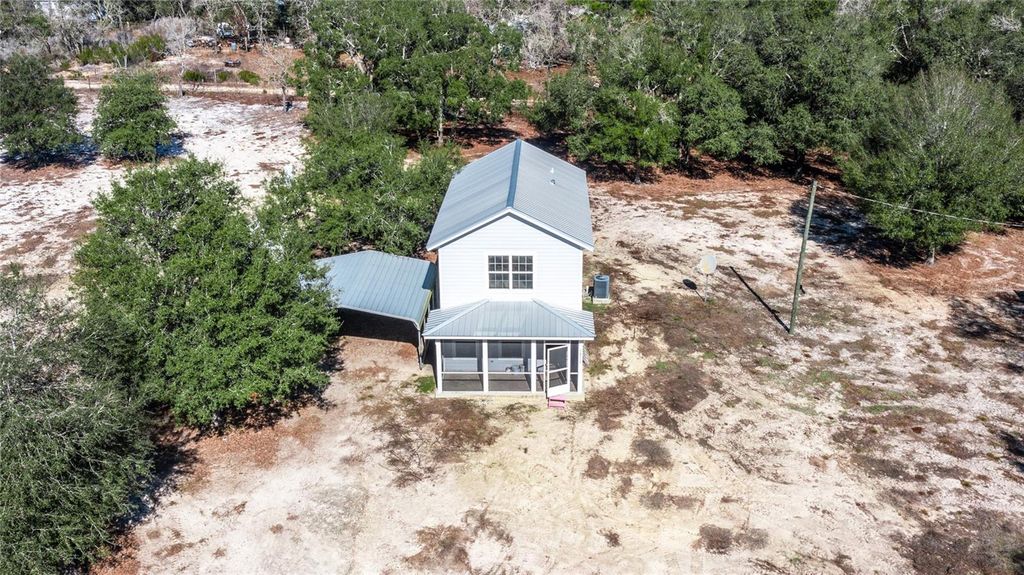 Photo of 10711 NE 98th Lane, Archer, FL 32618 (MLS # GC536806)