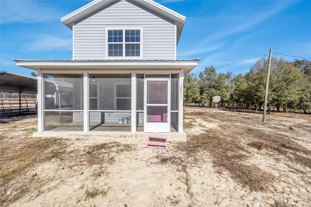 Photo of 10711 NE 98th Lane, Archer, FL 32618 (MLS # GC536806)