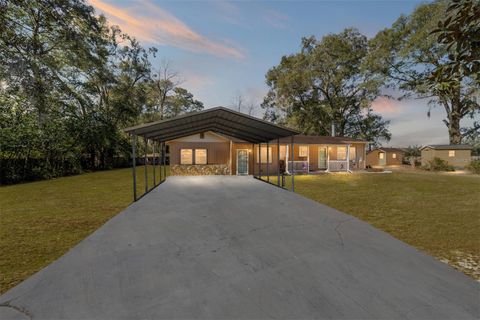 Photo of 5200 NE 25th Avenue, Ocala, FL 34479 (MLS # OM718261)