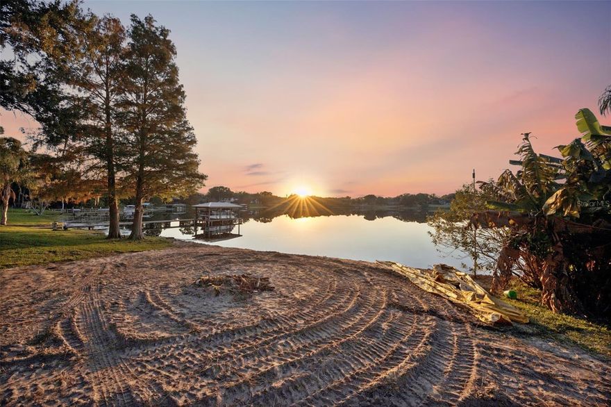 Don't miss this rare opportunity to own one of the last remaining buildable lakefront lots on the highly sought-after East Crooked Lake, a 153-acre private, spring-fed lake. This 0.54-acre parcel offers 100 feet of direct lake frontage - no roads to cross. This is one of the last remaining vacant lots on East Crooked Lake, where your backyard truly meets the water. The land is ready for your dream home, with ample space for a custom build, outdoor living and entertaining, and even space for a pool! Plus, there are no city taxes to pay here!!! Spend your days immersed in lake life, from swimming, paddleboarding, fishing, skiing, and boating right from your private shoreline. As evening falls, unwind while taking in breathtaking year-round sunsets. Located just minutes from US-441, you'll enjoy quick access to everyday conveniences, including dining, shopping, and charming downtowns like Mount Dora and Eustis.