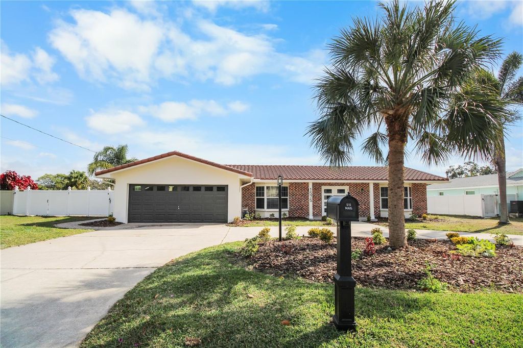 Photo of 1575 Brookside Boulevard, Largo, FL 33770 (MLS # TB8452957)