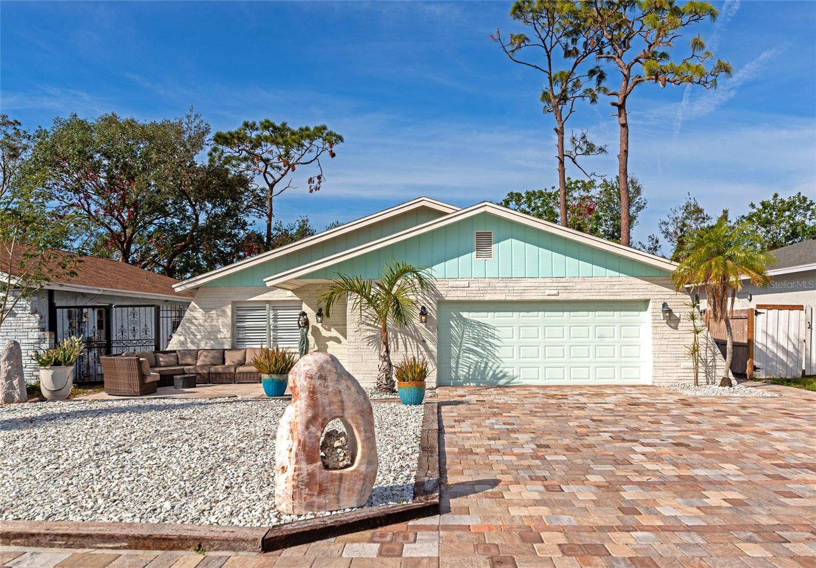 NEW PRICE $5000 ADJUSTMENT, UPGRADES & MAJOR SYSTEMS REPLACED. This Ranch style charmer features 3 bedrooms, 2 full baths, an over-sized 2 car garage, 7 parking spaces and is located in the high and dry area of Highlands/Bee Ridge neighborhood of Sarasota. NO HOA FEES, NO AGE RESTRICTIONS, NO WATER OR SEWER BILLS, HAVE YOUR PETS, BOATS, WORK TRUCKS, RV, MOTORCYCLES...FREEDOM! This move in ready home awaits your personal touches, situated in a prime location, low traffic, dead end street. NO FLOOD ZONE (X) no rules/regulations and the upgrades to the systems and property make for a low overhead, low maintenance lifestyle. This forever home, is a valuable investment, and the appraised value reflects the fair market price approved by FHA lenders. With newly installed upgrades in 21-23/24 Septic System, Electrical Panel (optimized and underground), HVAC system, Well System, Garage Door, Hot Water Tank, Travertine block pavers for driveway walkways and rear patios are maintenance free, low mow here (less landscaping costs). Solid block build and details include new bathroom cabinetry, Kohler toilets, vinyl plank flooring, whisper shut kitchen cabinets, newer washer & dryer, and electrical upgrades throughout. The yard offers green space for pets, gardening, a pool and your outdoor oasis. The spacious screened lanai flooring is marble block tile and there's plenty of room to expand, add more living space and simply relaxed and enjoy. The neighborhood offers a variety of updated homes and boasts a strong sense of community with convenient access to top-ranked schools, shopping centers, restaurants and all that Sarasota and Manatee County have to love. You are near to transportation (public, I-75, SRQ) yet within a quiet, quaint neighborhood. Near to newly renovated golf courses, parks, nature reserves and beautiful beaches. A short distance to downtown Sarasota, art galleries, cultural and social events, museums, Legacy Trail (hiking/biking), top-rated medical facilities, senior care, Ashton elementary (under 2 miles) & College/Universities. The area is upcoming with economic growth & development, this is the perfect location and opportunity to buy, invest and grow in Sarasota.
