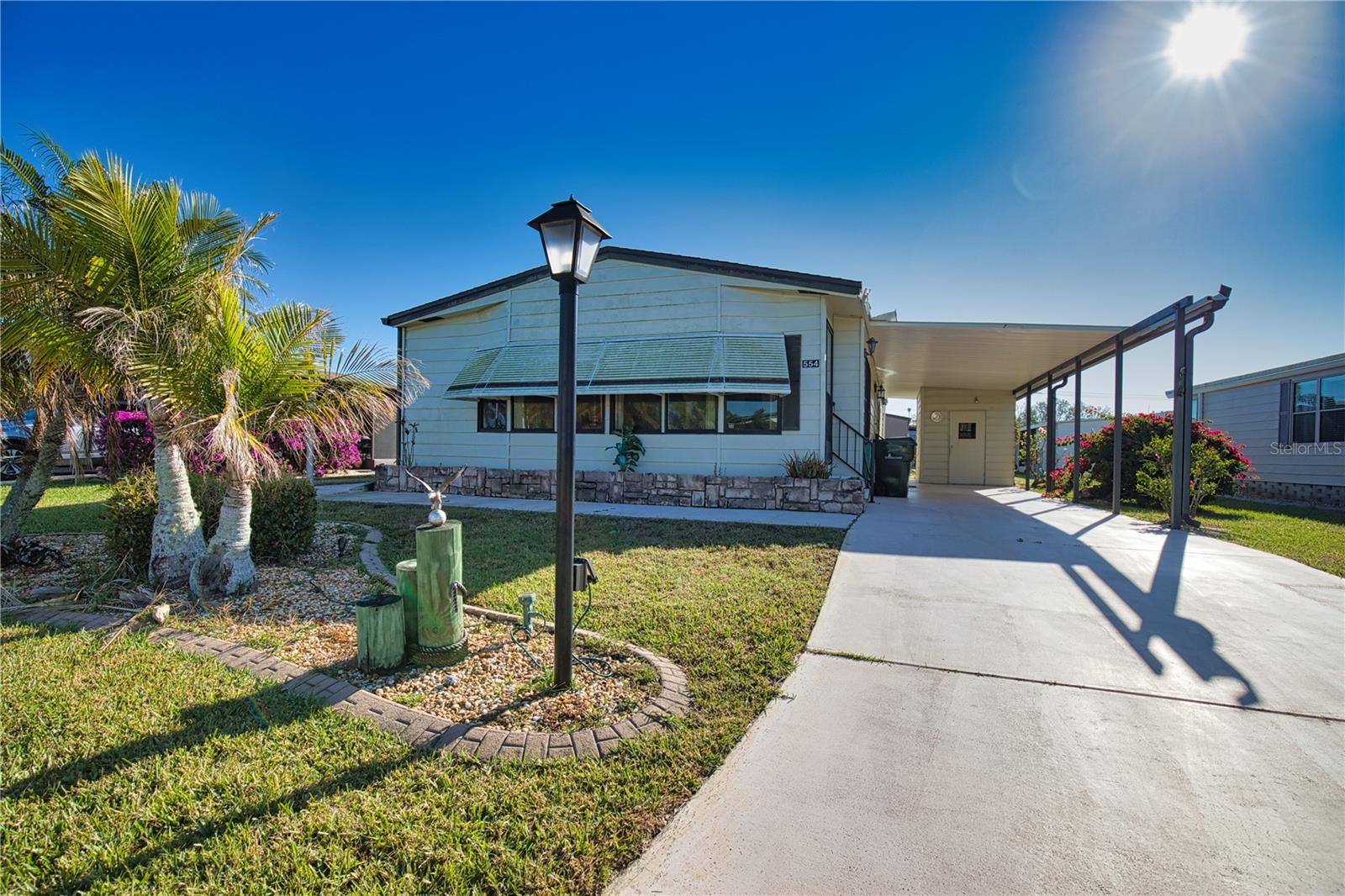 If you’re searching for a rewarding renovation project, look no further—this is your perfect opportunity! Nestled on a serene street in a vibrant 55+ community, this home invites your creative vision. As you step inside, you'll be greeted by a spacious kitchen and dining room combination that boasts an abundance of countertop and cabinet space. The dining area features a charming built-in wet bar, making it the ultimate space for hosting gatherings and entertaining friends. A set of sliding doors opens up to a generous Florida room, where you can savor your morning coffee or unwind with an evening drink in a relaxed setting. At the front of the home, you’ll discover another inviting living and dining area, perfect for more formal gatherings. The primary bedroom is a true retreat, offering ample space, double closets, and an ensuite bathroom that boasts a soothing soaking tub alongside a luxurious walk-in shower. Guests will appreciate their stay in the cozy guest room, complete with a spacious walk-in closet and a thoughtful Jack and Jill bathroom, ensuring everyone enjoys their privacy. This home is an exceptional canvas to update and personalize, allowing you to embrace the enchanting Florida lifestyle with the La Casa community! Don't miss out on the chance to make it your own and create your dream oasis.
Welcome to La Casa, an enchanting community where 974 exquisite homes are beautifully set among native trees, surrounded by spacious common areas and eight serene lakes. Our generous 60 by 80-foot lots offer your ideal space. Perfectly located between Sarasota and Fort Myers, La Casa is a boater's paradise with direct access to the stunning Gulf of Mexico. Enjoy easy access to shopping, sightseeing, golfing, and fishing, all while immersing yourself in the rich culture of Southwest Florida. Experience the warmth of Southwest Florida’s winters in a relaxed environment, far from the east coast hustle. Our lush, mature landscaping reflects the dedicated care of residents and management. La Casa features some of the finest pools in the area, including our magnificent 40 by 60-foot swimming pool, maintained at a delightful 87 degrees, and a cozy 20 by 40-foot pool nestled between the clubhouse and Activity Building, both with inviting hot tubs. Stay connected with our complimentary Wi-Fi at the Clubhouse, Activity Building, and Recreation Hall while you soak up the sun. La Casa is a family-friendly haven where you can enjoy tranquility while remaining close to vibrant attractions. Come visit our charming oasis and discover why La Casa is the ultimate destination for snowbirds and year-round residents!