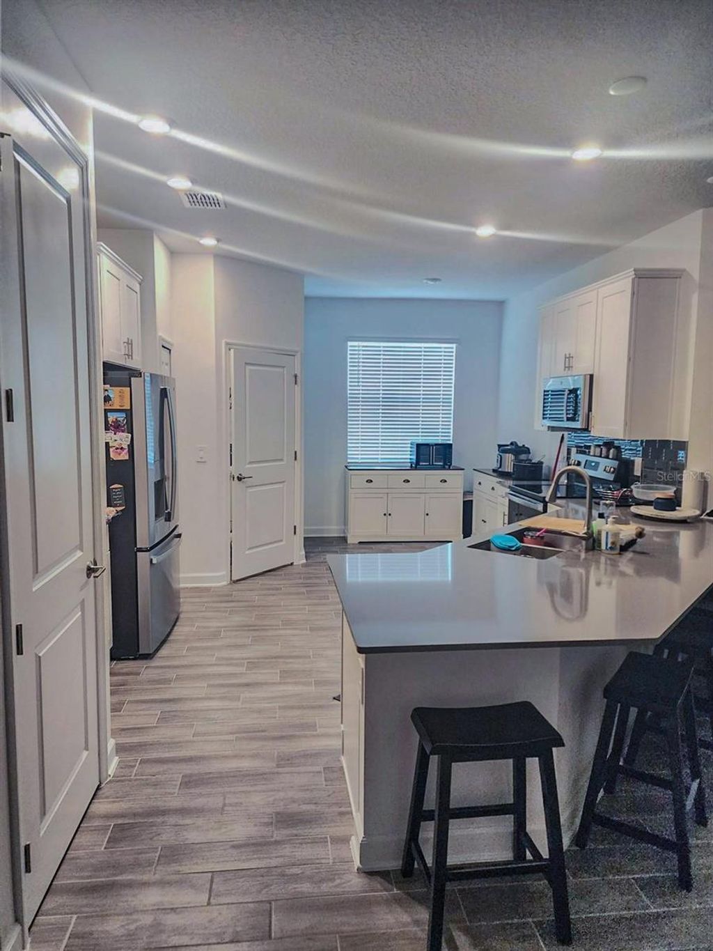 Photo of 1743 Good Neighbor Loop, Kissimmee, FL 34744 (MLS # O6403890)