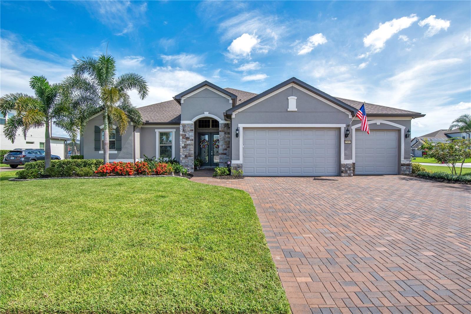 Welcome to your private oasis in the Estates at Lake Pickett — a gated enclave offering exclusive access to spring-fed Lake Pickett, a 763-acre, crystal-clear lake ideal for waterskiing, fishing, and year-round water sports. Situated on over ½-acre corner lot in a cul-de-sac with serene pond views, this estate home combines elegance, versatility, and modern design in one impressive residence.
From the moment you enter, you will be greeted by a grand entry and luxurious details like crown molding throughout, 7.1 surround sound entertainment system, and satin-finish paint that adds warmth and sophistication to every room in this 4-bedroom, 3-bathroom home with an office and over-sized garage. The spacious family room features an elegant entertainment wall (2023) with built-in shelving, electric fireplace, and TV hookup anchors the open-concept living area, ideal for relaxing or entertaining. The spacious gourmet kitchen boasts 42" cabinetry, granite countertops, stainless steel appliances, and an oversized walk-in pantry that is a chef's dream. Adjacent to the kitchen is a flexible kitchen nook that is perfect for family meals, homework station, or craft area that overlooks the sparkling pool and screened lanai, which offers expansive covered outdoor living. The split floor plan provides privacy for the primary suite that features two oversized walk-in closets, tray ceiling, and a spa-style bath with dual vanities and an oversized walk-in shower. The home’s versatile layout includes 2 bedrooms with a Jack-and-Jill bath and additional bedroom with its own private bathroom that can access that back patio and pool area. Outdoors, enjoy the oversized backyard and beautifully landscaped grounds enhanced by a paver patio and screened salt pool. Enjoy access to the private neighborhood boat ramp, dock, and park — all just a short walk away. With close proximity to UCF, Waterford Lakes Town Center, Lake Nona Medical City, and major highways (408, I-95, I-4), this home offers the perfect blend of tranquil lakefront living and city convenience. Schedule your private tour today and experience the lifestyle that awaits you at The Estates at Lake Pickett. Homes of this caliber rarely come available — don’t miss your opportunity to own this gorgeous home that is priced below appraised value.