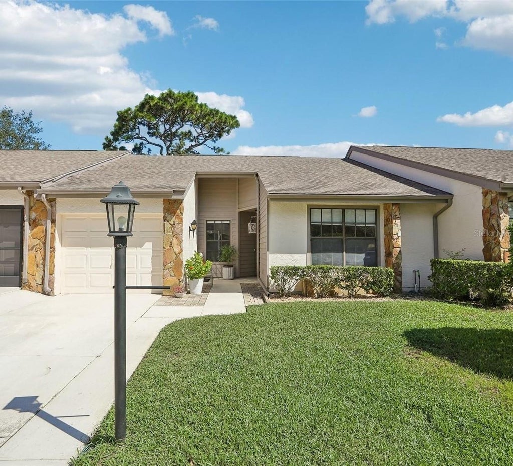 Photo of 6615 Inverary Ln, Spring Hill, FL 34606 (MLS # TB8550742)