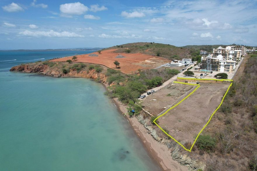 Excellent strategically located beachfront lot with residential/tourist zoning. Ideal for developing tourism projects with direct beach access and stunning ocean views. It features a private entrance. The lot measures 2,339 square meters and has all necessary permits from the Natural Resources Department (REA/DEA) and the Maritime-Terrestrial Zone. Just minutes from the town of Boquerón, restaurants, hotels, and steps from the new Esencia Luxury Residential project. Take advantage of this unique opportunity to invest and develop an impressive project with a private beach. Excellent priced below appraisal.