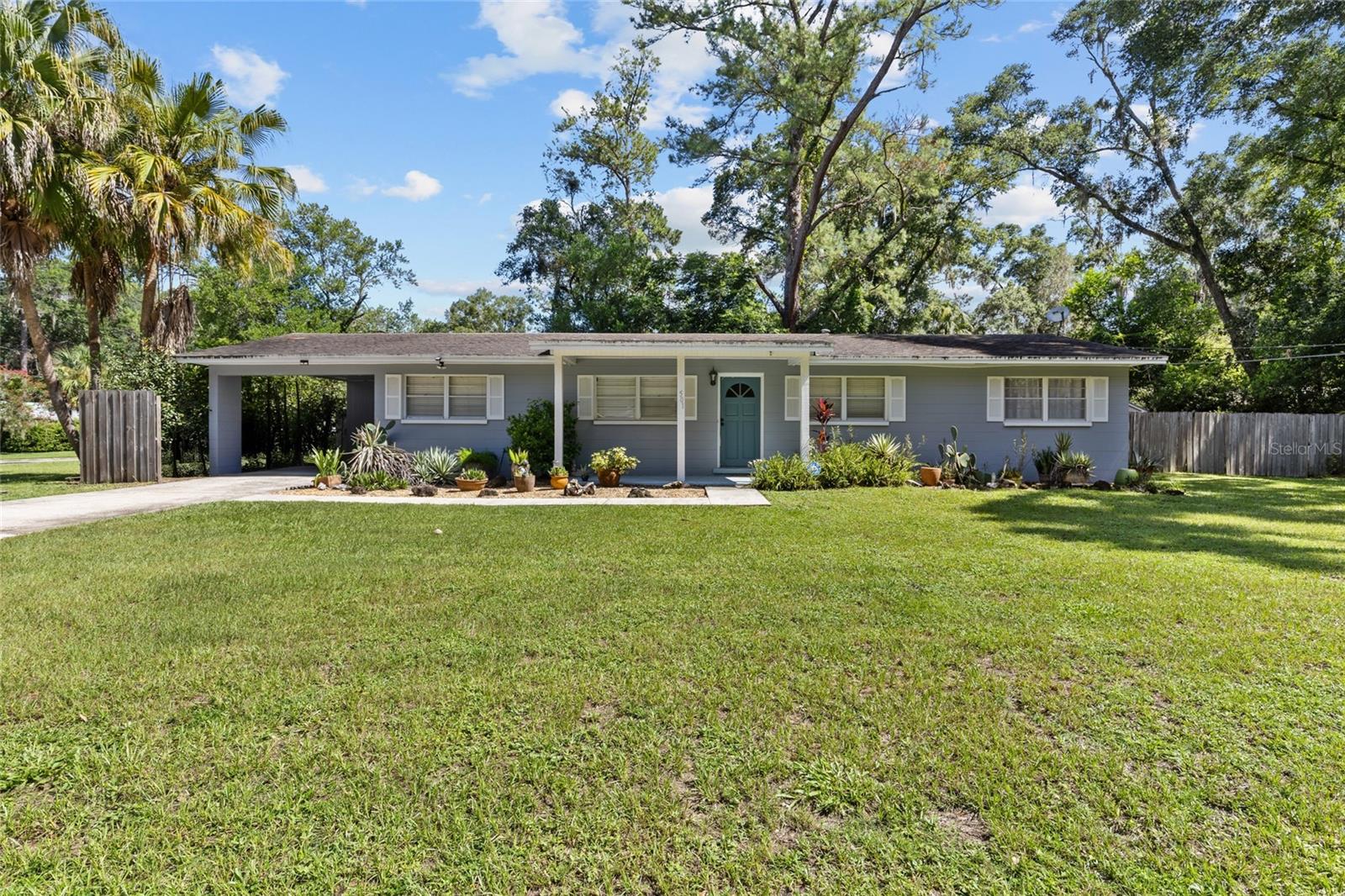 Looking for a 3 bedroom, 2 bathroom house in a PRIME location in city limits and NO HOA? Welcome to 501 NW 52nd Ter Gainesville, FL 32607! This concrete block home offers NO carpet throughout with NEW LVP flooring, updated NEW fridge and dishwasher, newly painted countertops, upgraded electric, fenced in backyard and HUGE corner lot. With this can’t-beat location, you’re less than 3 miles and just a few minutes away from the University of Florida, making this convenient for a short commute to work or class and Gator games. There’s also incredible AirBnB or long-term rental potential here for game days, graduations, etc. Just a few blocks west is HCA North Florida Hospital! Right around the corner is more shopping whether it’s the Oaks Mall, shopping at Butler or anywhere around Gainesville, this central location makes it quick to get to any side of town! The huge corner lot offers ADU potential or you can have a large workshop/storage building! Inside, enjoy an open concept with a separate formal dining room, which could be made into a playroom or office. Extra cabinets for storage located off the kitchen are perfect addition to have. The primary bedroom has its own full bathroom and the other 2 bedrooms share the full bathroom with shower/tub combo. Step outside to your backyard by entering through the sliding doors and enjoy its beautiful serenity. The backyard is already divided for open possibilities - one side could be a play area, a designated space for your pets, or gardening area, and so much more! There is also a shed for your use. Through the carport, you have your own laundry room with additional storage. Enjoy this beautiful and well-priced home - call/text to schedule your private tour!