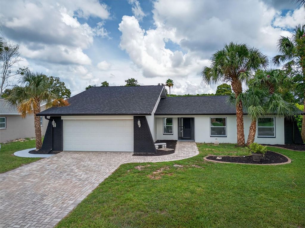 Photo of 10221 Landmark Drive, Hudson, FL 34667 (MLS # W7878000)