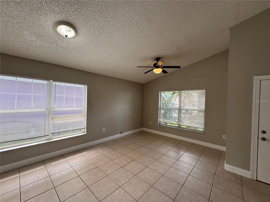 Photo of 1143 Fremont Park Avenue, Orlando, FL 32808 (MLS # O6384967)