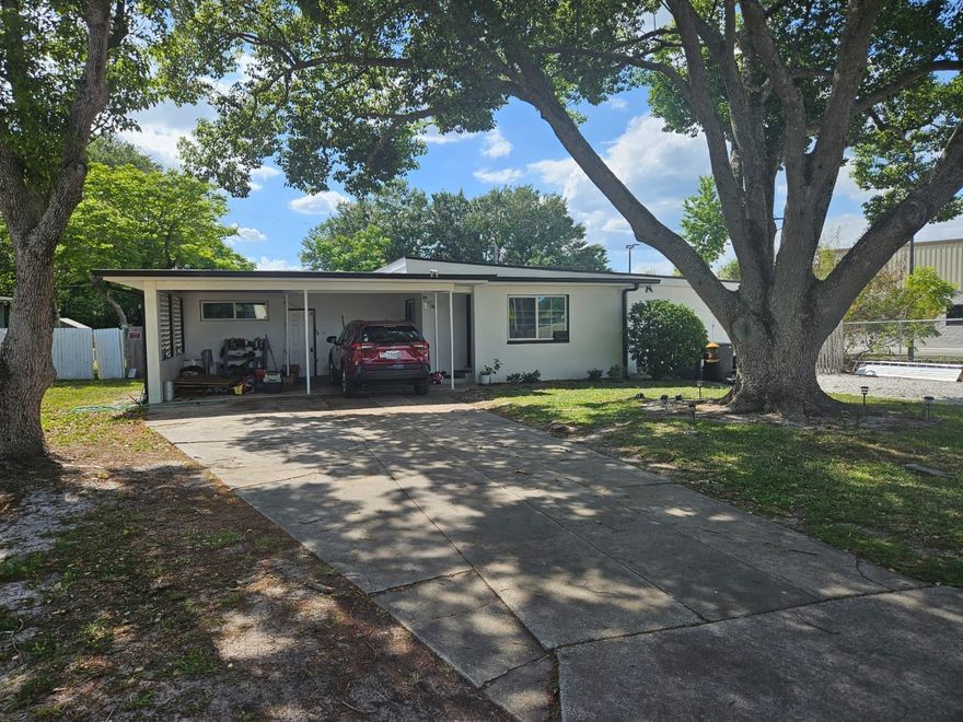 Discover a unique opportunity in the heart of Sanford, Florida, where location, land size, and potential come together to create exceptional value. Situated on a generous  lot, this single-family property offers flexibility for both homeowners and savvy investors looking to capitalize on Central Florida’s continued growth. This residence features a great BONUS DETACH ROOM FOR A POTENCIAL ADU'S ( DETACH Auxiliary Dwelling Unit) , including additional structures such as a detached garage, covered patio, and carport—ideal for storage, workshop use, or future upgrades. The layout provides a solid foundation for renovation, repositioning, or rental income strategies. The expansive lot opens the door to multiple possibilities: additions, outdoor living enhancements, or even redevelopment potential (subject to zoning). Whether you’re looking to renovate and resell, hold as a rental, or customize into a primary residence, this property delivers versatility rarely found at this price point. This property stands out as a value-add opportunity in a high-demand corridor. With its large lot, multiple structures, and prime location. This is your chance to secure a property with strong upside potential in one of Central Florida’s most promising markets. Schedule your showing today and unlock the full potential of this Sanford opportunity.