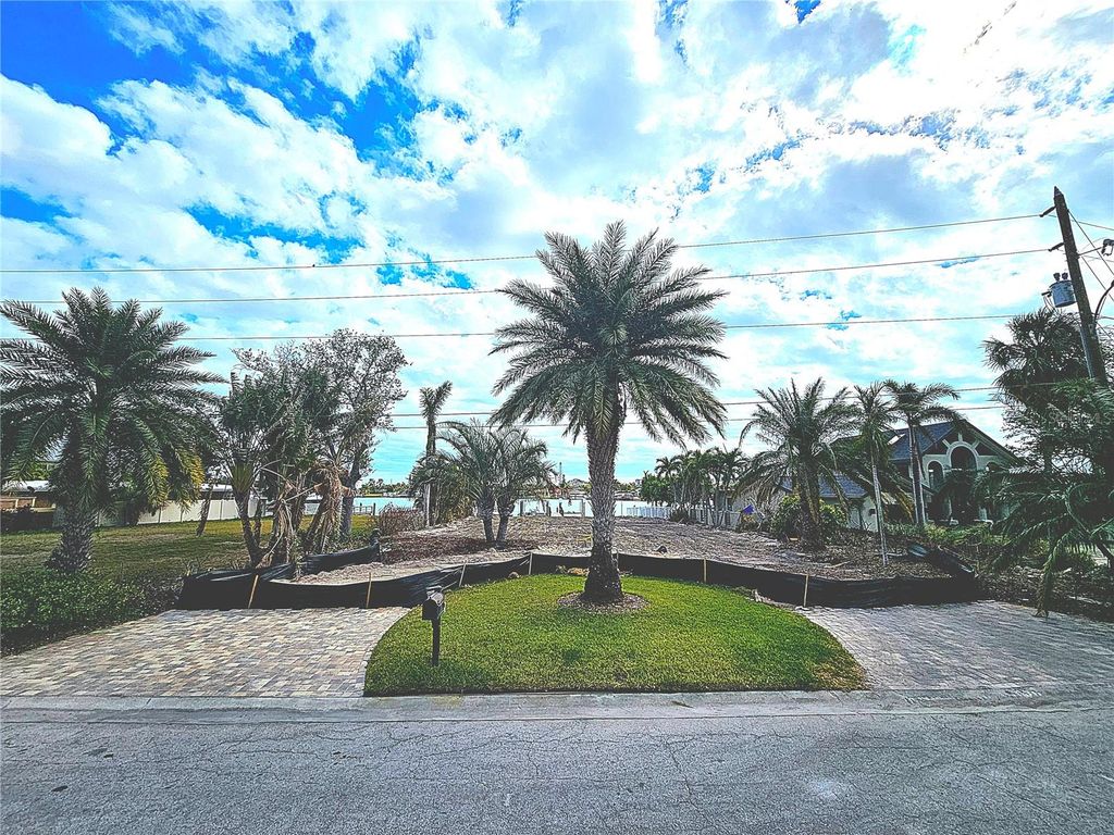 Photo of 55 Dolphin Drive, Treasure Island, FL 33706 (MLS # TB8337568)