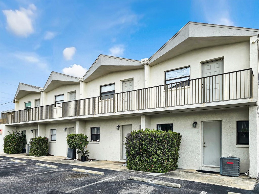 Photo of 382 S Orlando Avenue, Cocoa Beach, FL 32931 (MLS # TB8557404)