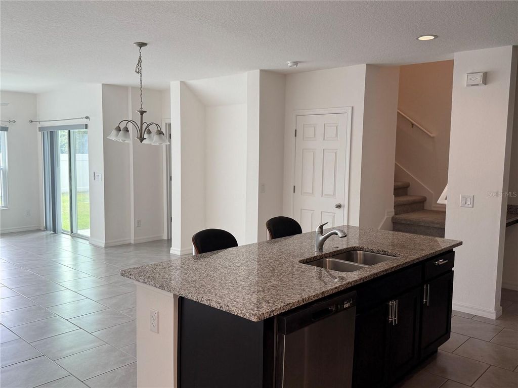 Photo of 1179 Woody Cypress Drive, Kissimmee, FL 34746 (MLS # O6364910)
