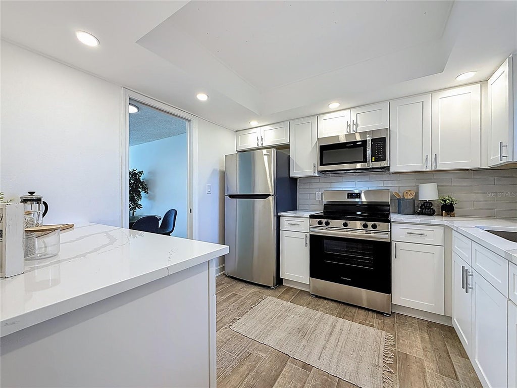 Photo of 4550 Cove Circle #106, St Petersburg, FL 33708 (MLS # TB8554414)