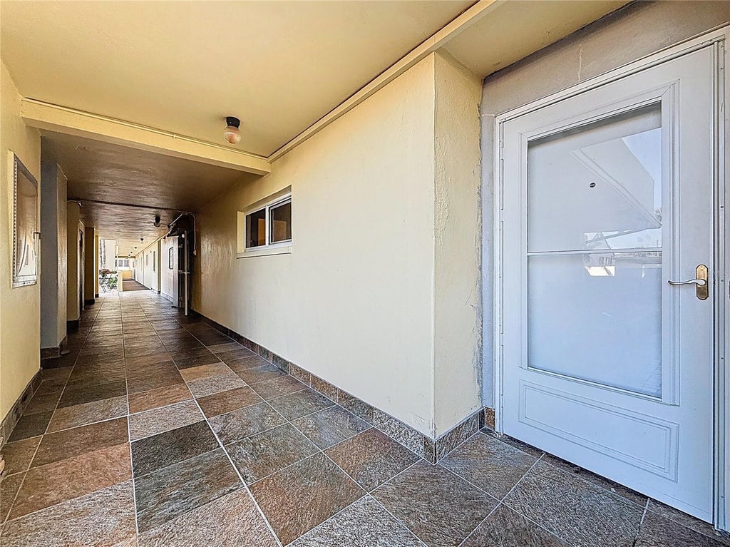 Photo of 4550 Cove Circle #106, St Petersburg, FL 33708 (MLS # TB8554414)