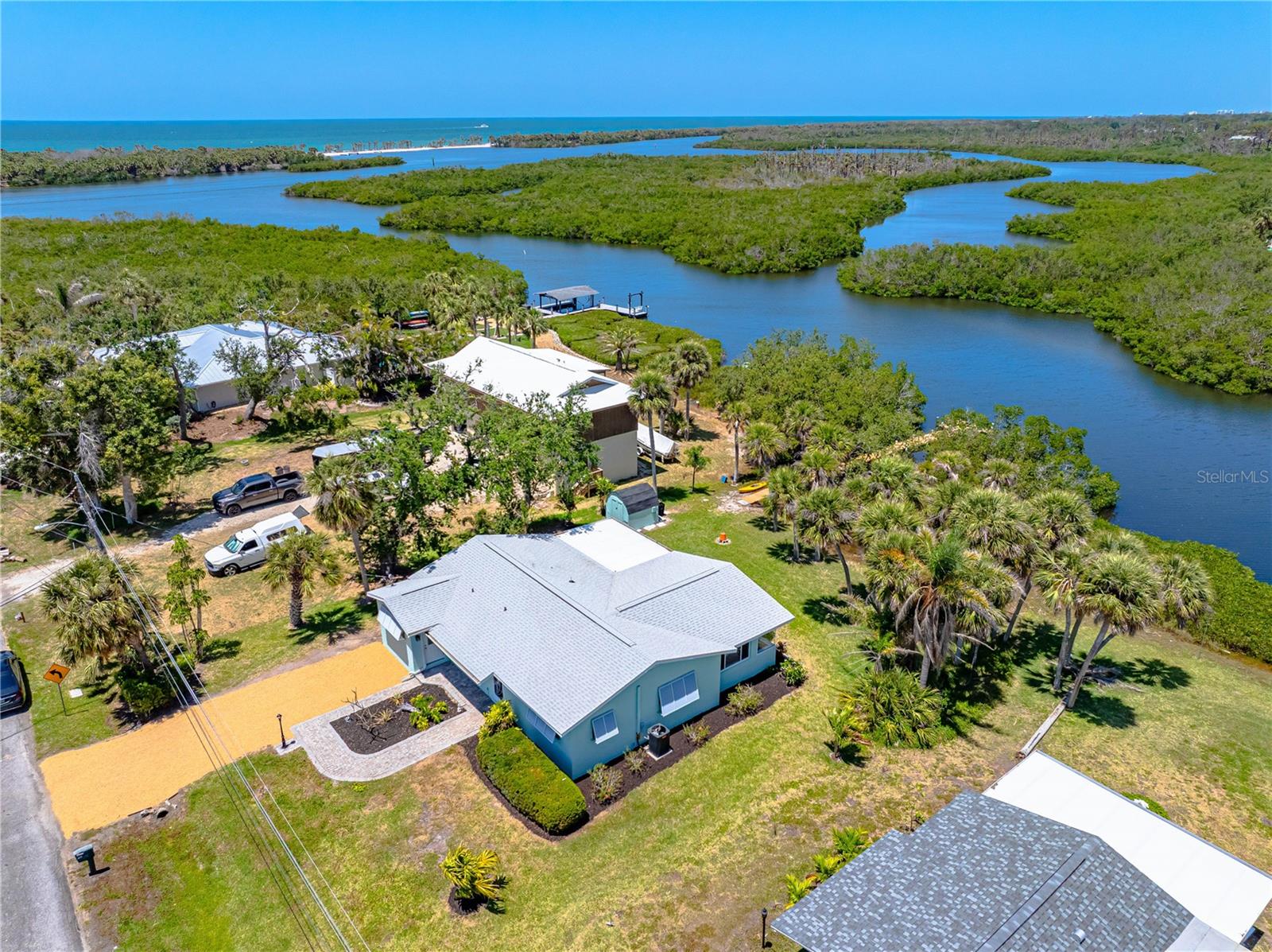 SIGNIFICANT PRICE REDUCTION!!! Highly Sought-After BOAT FRIENDLY, WATERFRONT Home, with PRIVATE BEACH ACCESS in South Venice.
-
Very recent remodel and renovation completed with quality craftsmanship, this stunning home features remarkable fit and finishes throughout. Located on a quiet waterfront street, 1680 Lemon Bay Dr. sits right at the mouth of the Intracoastal Waterway with unobstructed, direct access to the Gulf of America from your own backyard.The 100’ mangrove walk and dock has been completely rebuilt and offers optimal water depth for docking a boat. From your backyard dock you can easily paddle board or kayak within a couple minutes to your very own private beach oasis, available exclusively to you and your immediate neighbors.
Thoughtfully designed with an open-concept floor plan, the kitchen and dining area flow seamlessly into the main living space, where panoramic bay windows frame breathtaking waterfront views and mature palm trees.
The brand-new kitchen is a showstopper—featuring all-new stainless steel appliances, a large island and genuine marble countertops throughout, and bright, modern cabinetry.
Retreat to the primary suite, complete with a beautifully remodeled ensuite bathroom and walk-in closet. The bathroom boasts a sleek double vanity with shaker cabinetry, while the walk-in shower steals the spotlight with floor-to-ceiling true marble tile and a bold blue glass accent, adding a modern touch. From the primary suite, enjoy direct access to the covered, screened lanai—perfect for relaxing and taking in the tranquil views.
The private backyard is a peaceful escape, ideal for morning or evening paddleboard/kayak excursions or simply unwinding in a hammock strung between the palm trees. After the fun has been had, you can refresh in the outdoor shower. The possibilities are endless when it comes to enjoying Florida’s natural outdoor beauty from this home.
ADDITIONAL UPDATES INCLUDE : This home has been extensively remodeled, also including interior and exterior paint, new tile flooring throughout, authentic marble finishes throughout. recessed lighting, rebuilt dock, 2025 HVAC, 2025 updated plumbing and electrical, 2025 well pump and filtration system.
FEATURED LOCATION: 1680 Lemon Bay is situated as one of the closest homes to the South Venice Beach Ferry, offering exclusive access to a private beach for South Venice residents. Downtown Venice offers a quaint, historic atmosphere with a true small-town feel. it’s the perfect place to enjoy boutique shopping, local dining, and coastal culture with live performances at the Venice Theatre.
You're also just minutes from Venice Municipal Airport, local public beaches, and main road; US-41 (Tamiami Trail), with a wide variety of shops and restaurants nearby.
Schedule your private showing today to discover everything this remarkable home has to offer!