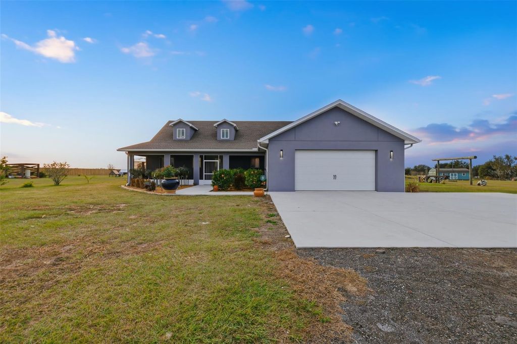 Photo of 17165 Lake Iola Road, Dade City, FL 33523 (MLS # TB8454252)