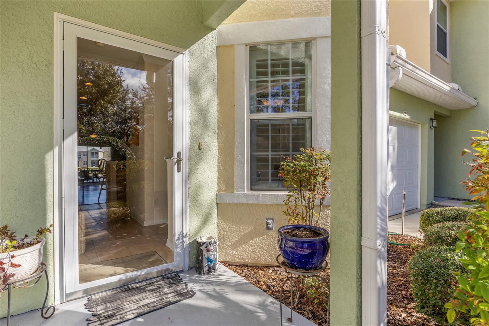 SELLER OFFERING CONCESSIONS TO HELP WITH CLOSING COSTS OR RATE BUYDOWN! Discover easy coastal living in this beautifully maintained 2-bedroom, 2-bath ground-floor condo located in the sought-after Cottages at Winding Creek. Just under 7 miles to Crescent Beach, this home offers comfort, convenience, and style. Featuring granite countertops throughout, stunning hardwood floors, spacious bedrooms, and a double vanity in the primary bath, every detail has been thoughtfully updated. Stylish louvered shutters add a coastal touch, and the screened-in back patio, with an extra storage closet, is perfect for relaxing outdoors. A 1-car garage adds additional convenience, and low HOA fees include access to a sparkling community pool, playground, and more. HVAC and water heater are both under 2 years old, and the refrigerator is less than a year old. Immaculately clean and truly move-in ready. Furniture is negotiable with an acceptable offer. Enjoy the best of St. Augustine living!