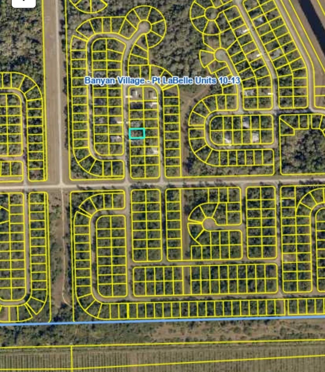 Build Your Dream Home on this Spacious 10,019?sq?ft Lot in Banyan Village. Nestled in a well-planned community just east of LaBelle, this residential lot offers a sizable, cleared canvas with central water, paved street, and fiber-ready infrastructure. Close to schools, shops, and major routes (US-27 & I-75), it’s also near the Caloosahatchee River and canal—perfect for boating or fishing. No HOA or architectural restrictions—ideal for custom builds or investment.