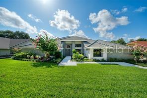 This beautifully landscaped four-bedroom home with large office was completely renovated and updated (2022), ROOF RECENTLY INSPECTED..offering 12 ft.ceilings in main rooms and in office, a spacious kitchen with 14 drawers, 23 cabinets, a self-lighting walk-in pantry, wine cooler, instant hot, new appliances, gas cooking, microwave/convention oven, granite counters, and huge island. Laundry/craft room features 8 cabinets, 9 drawers and 9 ft. counter. Gigantic family room has new gas fireplace and 12 ft.windows. Three linen closets, two hall closets, and a step-in closet in the master bath offer abundant storage, in addition to walk-in master closet. All new insulation, AC ductwork, and ceilings fans throughout (2022) keep this executive home comfortable year-round. All new lights and electric panel make for carefree future maintenance. Large living room opens into lanai thru 12 ft. pocket sliders. Dining room easily seats 10. Spacious covered lanai and large wet bar offer gracious outdoor entertaining around screened 15x35 salt water/solar heated pool 4ft. deep—great for pool games and keeping young children safe. Pool rescreened and refinished (2022) with all new equipment. Pool area features enclosed storage for pool and yard supplies and equipment. Two of the large secondary bedrooms open onto the pool through pocket slider. Large yard is beautifully landscaped and has an all-new (2022) sprinkler system. Oversized two-car garage has heavy-duty vinyl flooring, 17’ft.of enclosed floor to-ceiling storage- and space for a workbench.