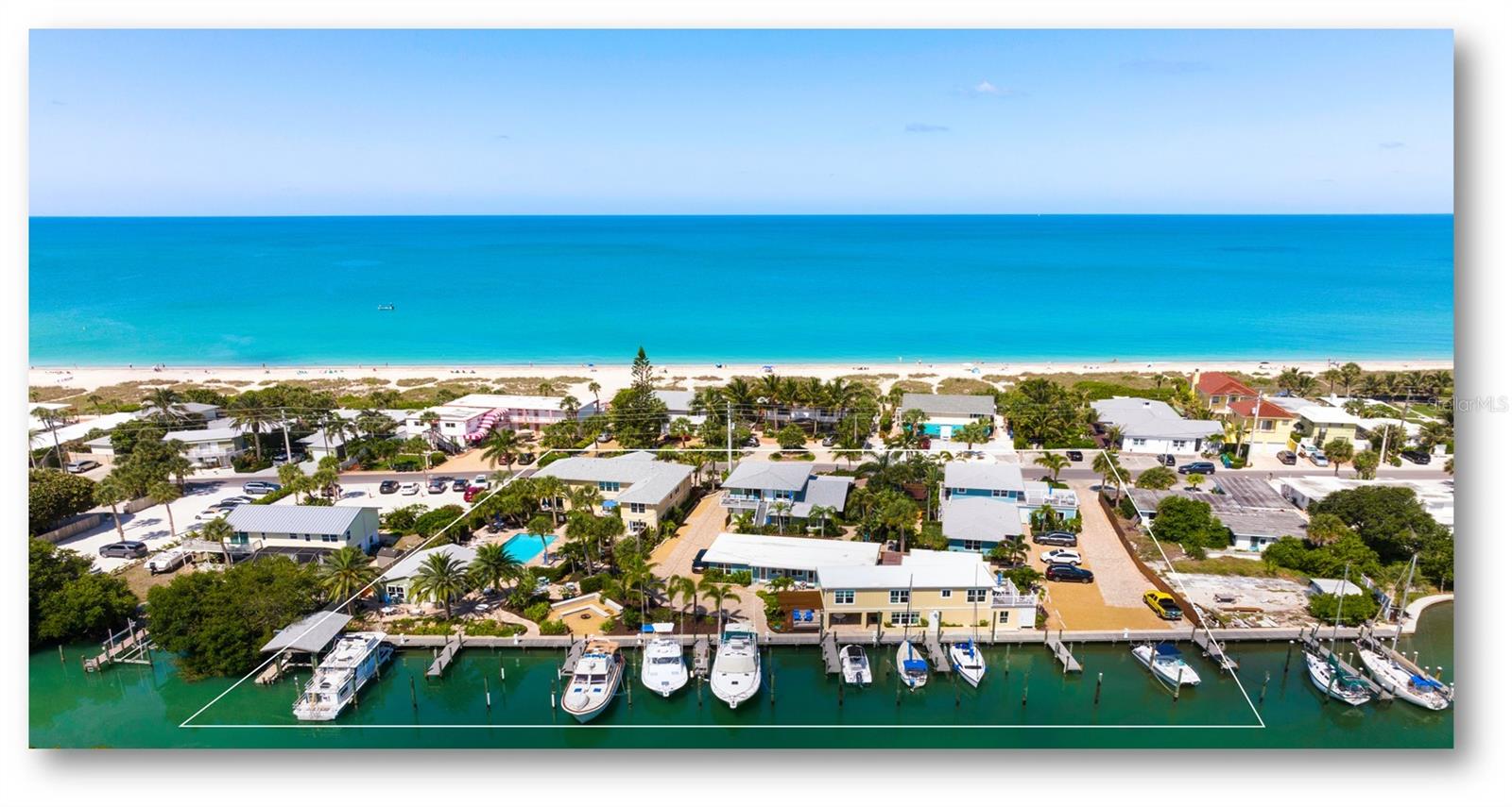 Under contract-accepting backup offers. Escape Resort and Marina is a rare opportunity to purchase a profitable boutique resort that exudes a tropical sophistication that is rarely found. This tropical oasis is comprised of seven buildings with enormous suites that have very recently been thoughtfully reconstructed. This Casey Key resort is located on over one acre of lushly landscaped waterfront paradise that is only steps from the pristine sand and welcoming waves of the Gulf of Mexico and located near delicious waterfront restaurants and world class shopping. The lushly landscaped paver walkways lead to 14 expansive rooms each open onto the outdoor patios & balconies with many rooms having a waterfront view. All recently reconstructed rooms have been extensively renovated with features that include all new roofs, electrical and plumbing, HVAC and mechanical systems, new drywall with wall to ceiling finishes, new flooring throughout, new category 4 windows and doors and light fixtures. Each room offers new full-sized kitchens with high quality cabinetry, countertops and stainless-steel appliances, flat top stoves, microwaves, and dishwashers. Rooms range from 2 bedroom with den/3 baths to large one-bedroom suites. Onsite, guests enjoy a large pool and sundeck, hip, fun common areas including a beautiful waterfront clubhouse with full kitchen, a waterfront amphitheater with firepit, BBQ grilling areas, bicycle and kayak rentals, and workout facilities. The enormous modern rooms are styled to perfection and adorned with flat-screen TV’s, free Wi-Fi, and high-end furnishings. The attention to detail is awe inspiring as represented by the high guest review ratings and return clientele. This is a very profitable resort that has consistently experienced year after year increases in occupancy/ADR with very strong projections for 2024. The recently reconstructed 15 dock marina provides an additional generous steady stream of income. The marina is located on sailboat water and can accommodate boats up to 50 feet, contains up to 50-amp electric, water, nine 20-foot finger pipers as well as one covered boat slip with lift. Escape Resort is truly a premier year-round waterfront resort and marina. The demand for waterfront island Vacation Rentals is extraordinary and this resort stays consistently full. Escape Resort and Marina is located on coveted Casey Key Island nestled just south of world-renowned Siesta Key and quaint Venice Island and is a short drive into Sarasota, the cultural capital of the south. This island has very little accommodation competition and rooms can be rented nightly, weekly, or monthly. This Florida island beach lifestyle includes awe-inspiring sunsets and guests enjoy this amazing experience. With all of the upgrades recently completed, this is a turn-key investment for any entrepreneur or experienced hotelier that will bring tremendous cash flow while enjoying a true Island beach experience. Please DO NOT walk the property without permission and DO NOT disturb Seller or Employees.