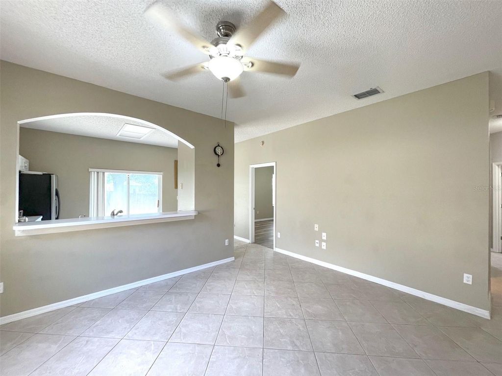 Photo of 12751 Woodbury Oaks Drive, Orlando, FL 32828 (MLS # O6404937)