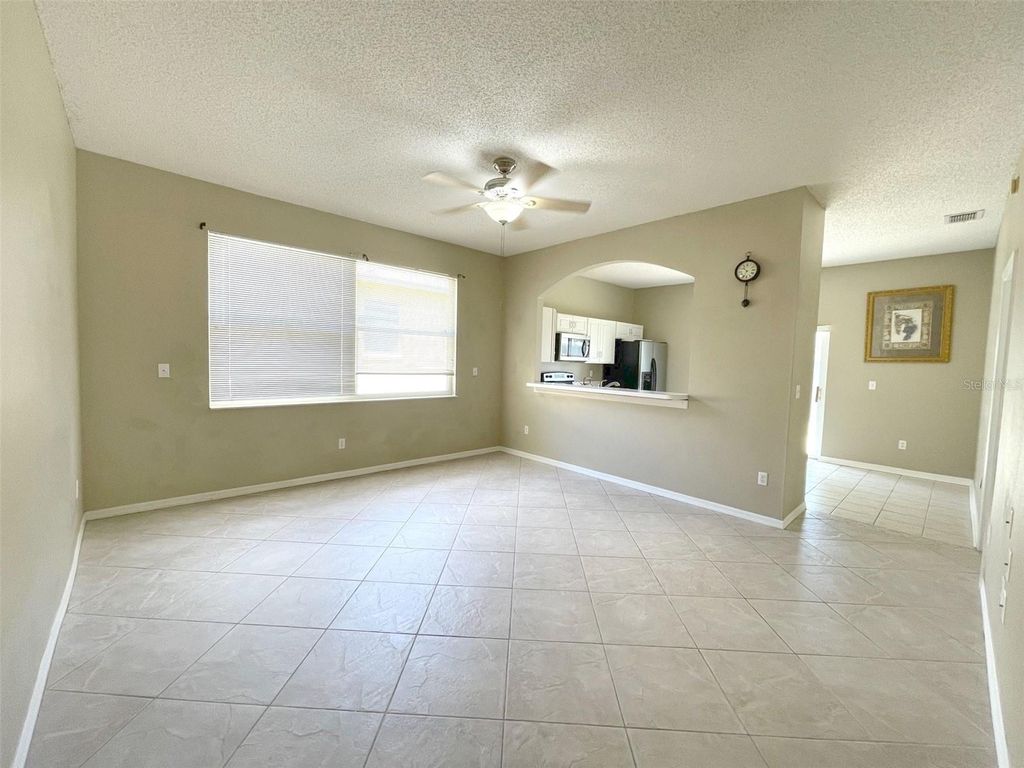 Photo of 12751 Woodbury Oaks Drive, Orlando, FL 32828 (MLS # O6404937)