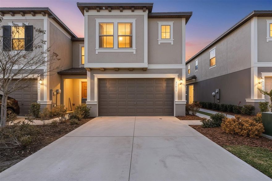 Welcome to resort-style living in the highly sought-after Epperson Lagoon community of Wesley Chapel! This stylish, nearly new 3-bedroom, 2.5-bath end-unit townhome with a 2-car garage offers the perfect blend of comfort, design, and location.
Enjoy added privacy and an oversized yard backing up to peaceful conservation views — a rare find in townhome living. Inside, you’ll love the bright, open-concept layout featuring a spacious kitchen that flows seamlessly into the family room, ideal for entertaining and everyday living. Custom built-ins in the closets maximize organization, while beautiful designer wood accent walls add warmth and character throughout. The smart, oversized layout lives large and is filled with natural light.
Located just minutes — and easy golf cart access — to Publix, Starbucks, and Chick-fil-A and to the world-famous Epperson Lagoon, you’ll experience true Florida lifestyle living. Convenient access to I-75 makes commuting to downtown Tampa a breeze.
Wesley Chapel continues to thrive with new hospitals, shopping, dining, and top-rated schools including Kirkland Ranch Academy of Innovation and Innovation Preparatory Academy right in the neighborhood.
Don’t miss this opportunity to own a move-in-ready home in one of Wesley Chapel’s most exciting and fast-growing communities!