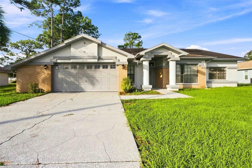 Photo of 12018 Villa Road, Spring Hill, FL 34609 (MLS # TB8532534)
