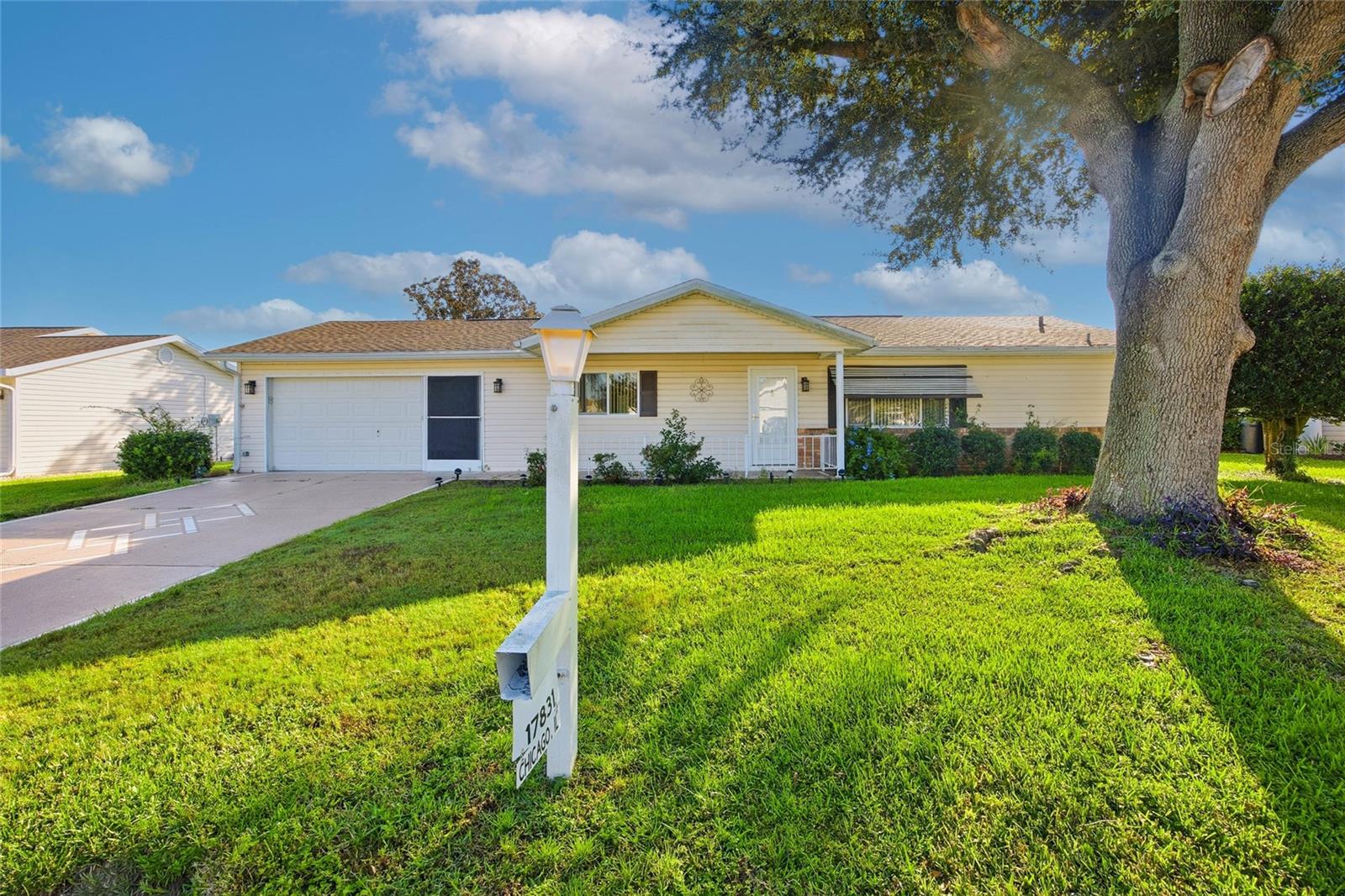 Discover this stunning 55+ community home featuring 2 bedrooms and 2 bathrooms in the charming neighborhood of Spruce Creek South. This lovely residence welcomes you with a cozy living room and a spacious kitchen, complete with ample storage for all your culinary needs. Enjoy your mornings on the enclosed lanai, which offers easy access to the backyard, perfect for relaxation or gardening. The community boasts an impressive array of amenities, including a clubhouse with a fitness center, his and her saunas, game rooms, and a large kitchen for hosting gatherings. Residents can enjoy entertainment on the stage, partake in billiards, and utilize the fitness center’s bathrooms, along with convenient outdoor facilities by the pool and office. Enjoy resort-style living with a sparkling pool, spa, outdoor game areas, picnic area, an 18-hole golf course, a pro shop, an on-site restaurant, RV/boat storage(low fee), even a softball field and numerous clubs & events . Experience the vibrant lifestyle that awaits!