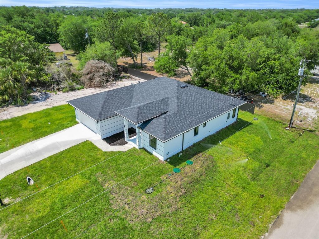 Photo of 3307 E 17th Street, Lehigh Acres, FL 33972 (MLS # C7524953)