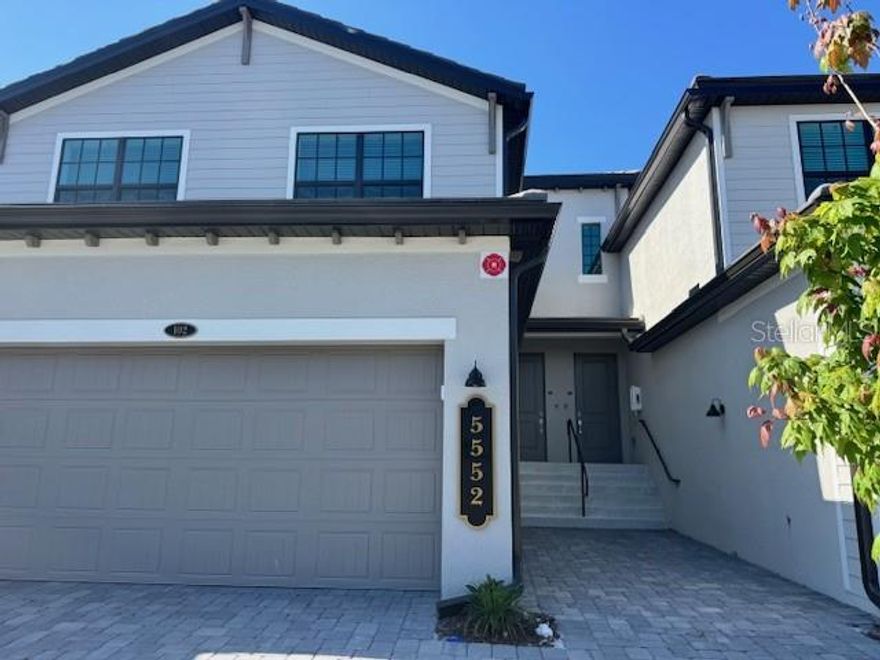 MOVE IN READY! COMPLETED NEW CONSTRUCTION COACH HOME IN LEGENDS COVE!
Welcome home to this modern open floorplan home with 3 bedrooms and 2 bathrooms boasting views over the largest lake in Legends Cove. This Lennar Homes **EVERYTHING INCLUDED** home includes all appliances, window blinds and decorator finishes. The living space includes large ceramic tile while the bedrooms are carpeted. Entertain in the light filled great room or step outside and relax on the screened lanai overlooking the community gazebo and the fountain in the lake teeming with turtles, ducks and a variety of Florida birds.
The oversized 2+ car garage offers plenty of storage for bikes and your beach and water toys.
Legends Cove is situated along El Conquistador Parkway offering short rides to the white sands of Bradenton, Anna Maria and Coquina beaches. World re-known IMG Academy is 5 minute drive away. IMG Golf Club is a short golf cart ride away.
Visit the surrounding areas of Bradenton and Sarasota offering a multitude of entertainment venues, cultural events, local beach and farmers markets, and casual or fine dining.
Legends Cove is just 20 minutes away from the newly expanded Sarasota International Airport, offering quick access for vacation or business travel.  Tampa International Airport is a direct drive one hour away.  Visit this new community today!