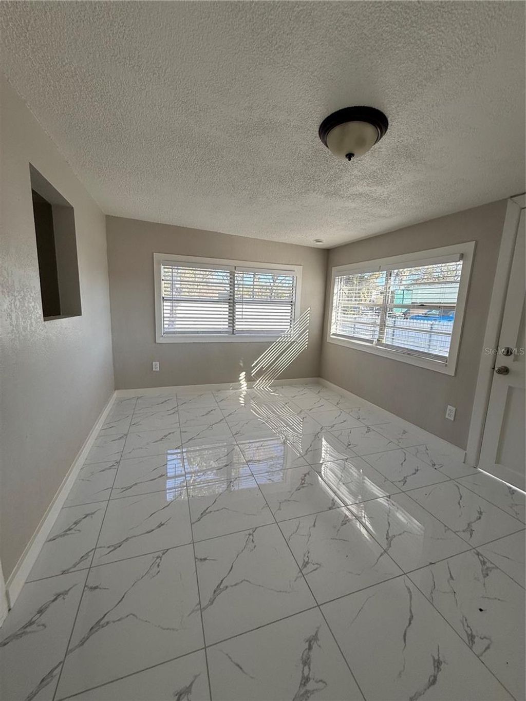 Photo of 2610 Eaton Avenue, Lakeland, FL 33803 (MLS # TB8471208)