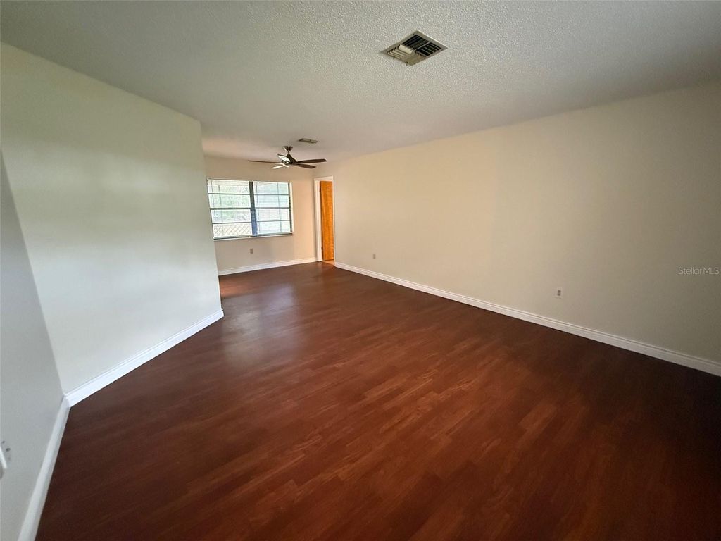 Photo of 5072 Lakewood Drive, Dade City, FL 33523 (MLS # W7884964)