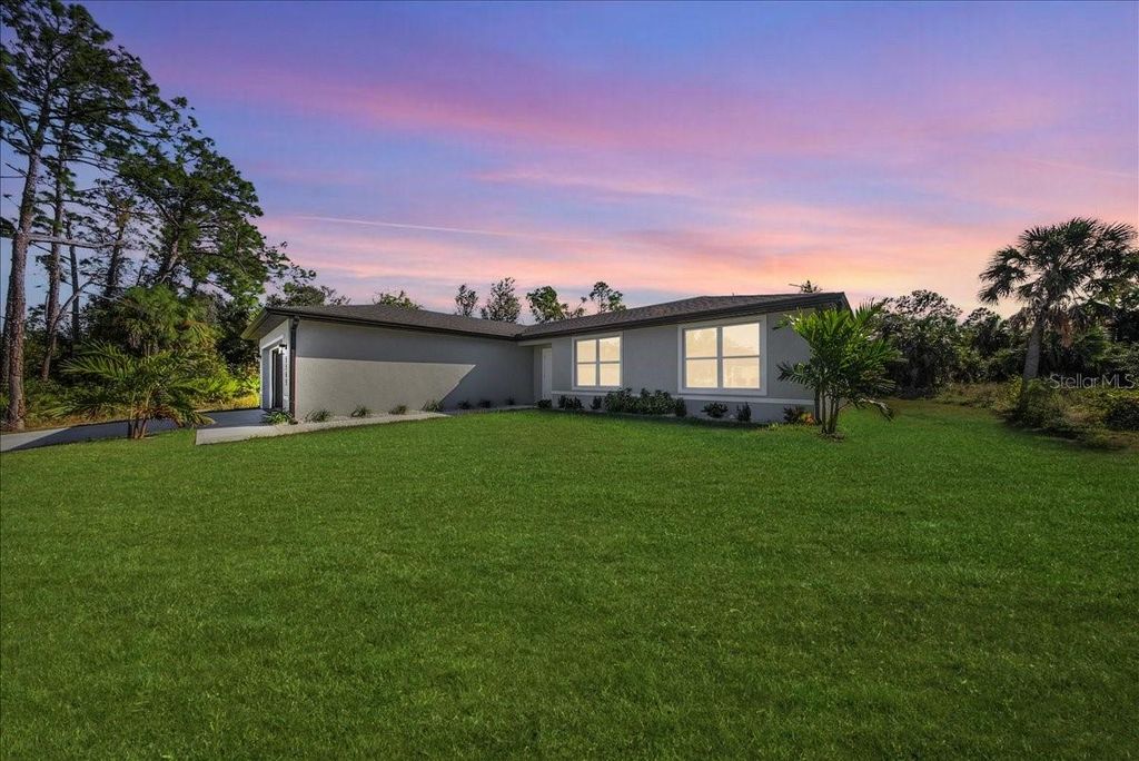 Photo of 5565 Lavender Avenue, North Port, FL 34288 (MLS # A4673587)